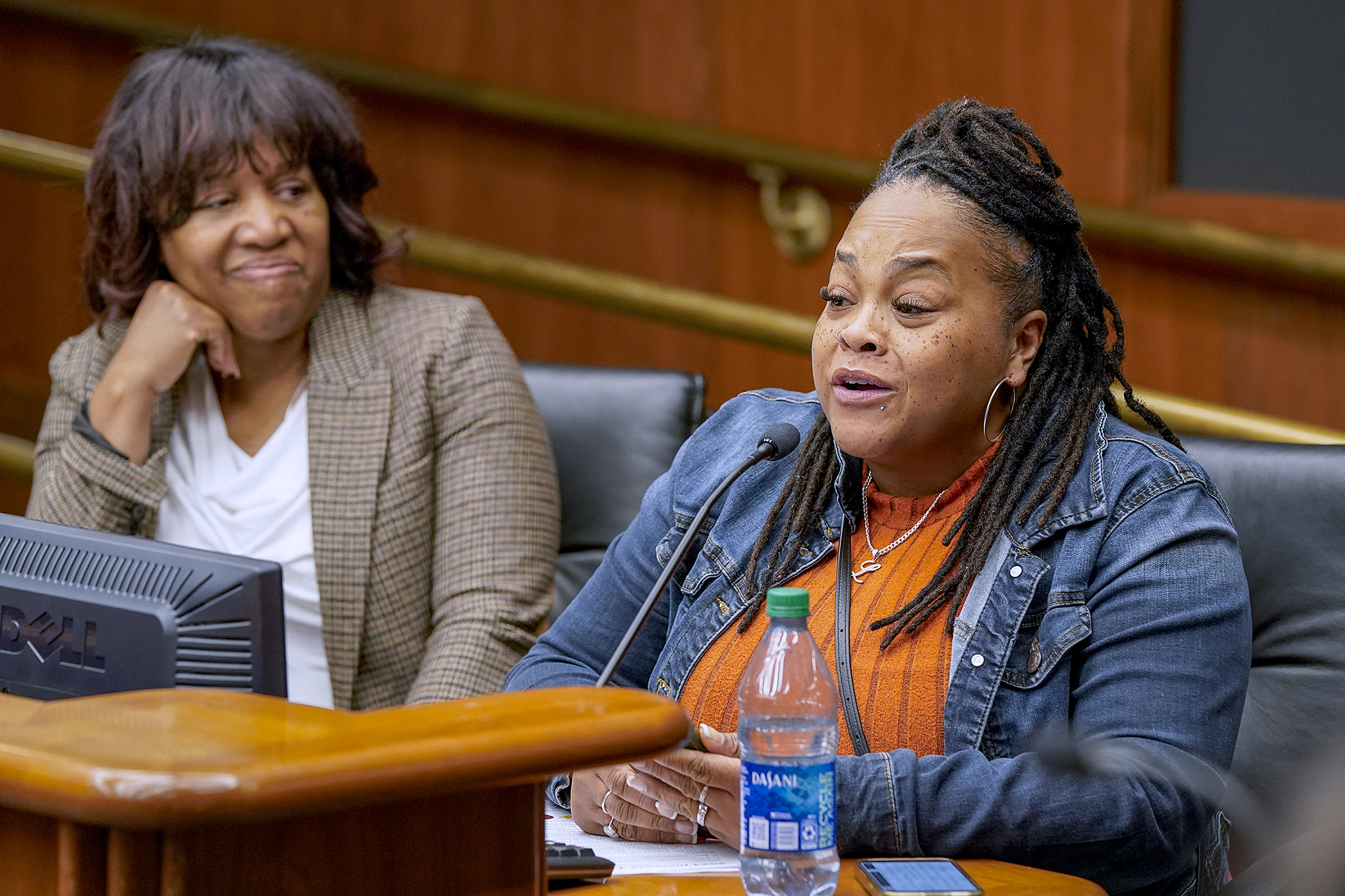 Laketa Buice, a teacher at St. Paul City School, speaks in support of HF4500, sponsored by Rep. Mary Frances Clardy, before the House Education Finance Committee March 13. (Photo by Michele Jokinen)